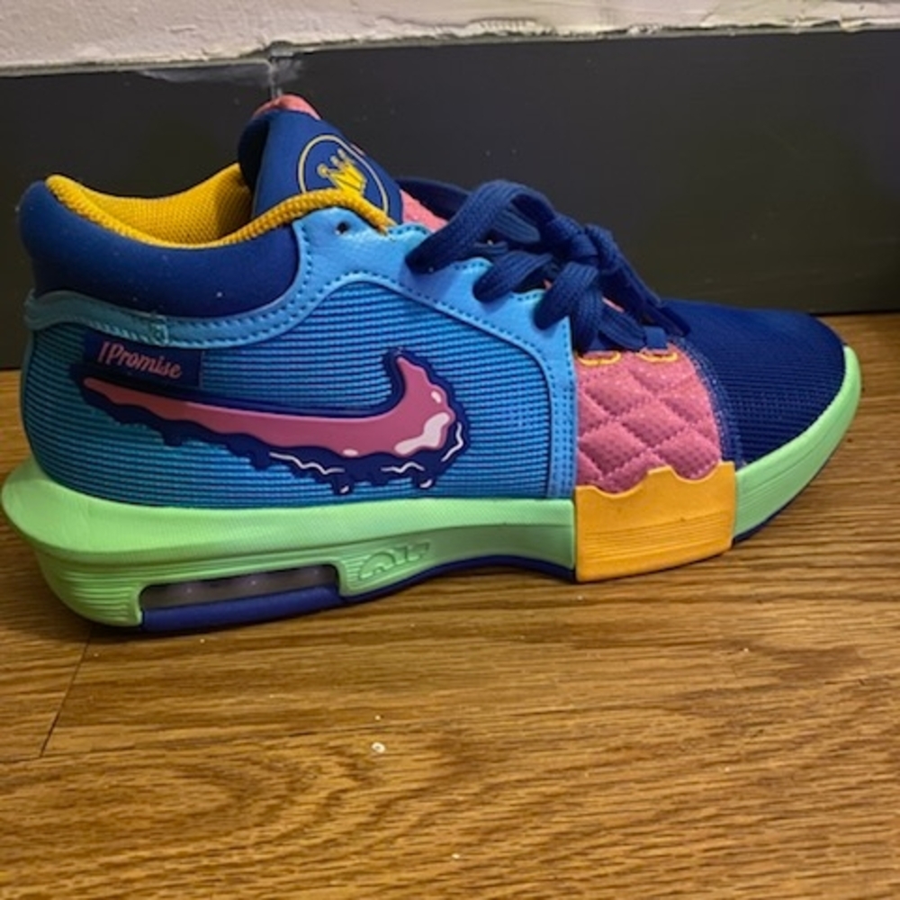 Nike Kids' Blue and Pink Sneakers with Green Accents